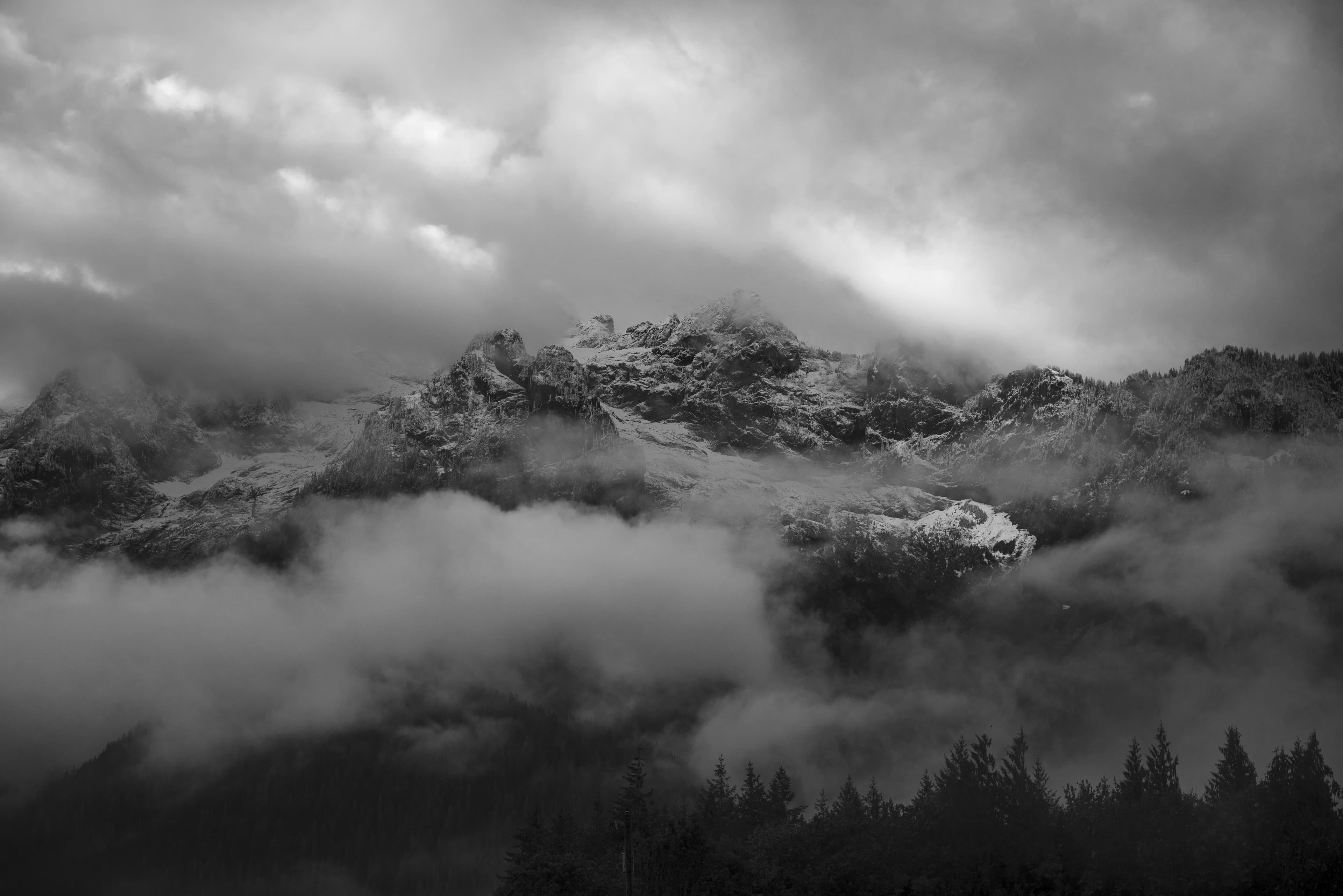 Monochrome mountain landscape in clouds